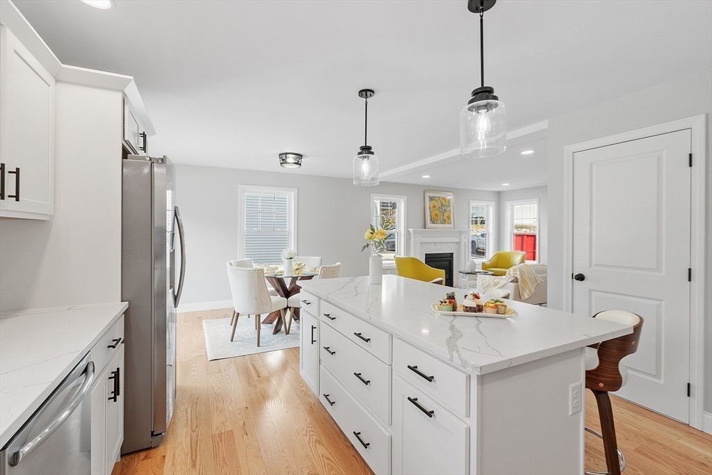 Dining room, Interior, Kitchen, Pendant Lights, Recessed Lighting, Stainless Steel Appliances, Wood Texture Flooring
