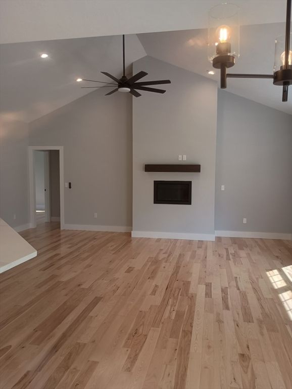 Empty room, Fireplace, Interior, Recessed Lighting, Wood Texture Flooring