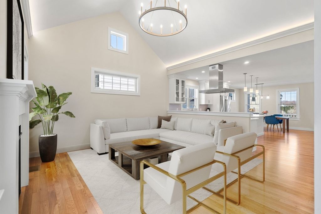 Dining room, Fireplace, Interior, Kitchen, Living room, Pendant Lights, Recessed Lighting, Stainless Steel Appliances, Wood Texture Flooring