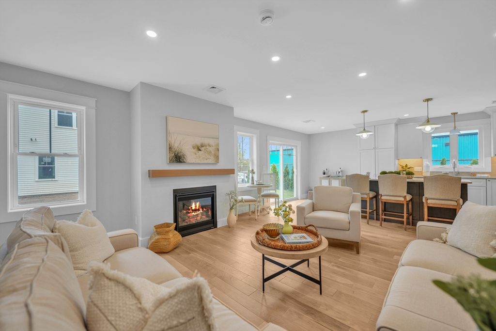 Dining room, Fireplace, Interior, Living room, Pendant Lights, Recessed Lighting, Wood Texture Flooring