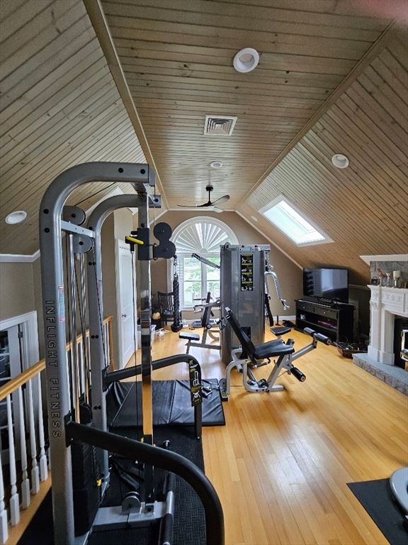 Fireplace, Fitness Equipment, Gym, Interior, Recessed Lighting, Wooden Ceilings, Wood Texture Flooring