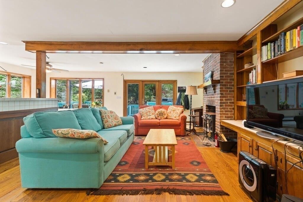 Fireplace, Interior, Living room, Recessed Lighting, Stone Walls, Wood Texture Flooring