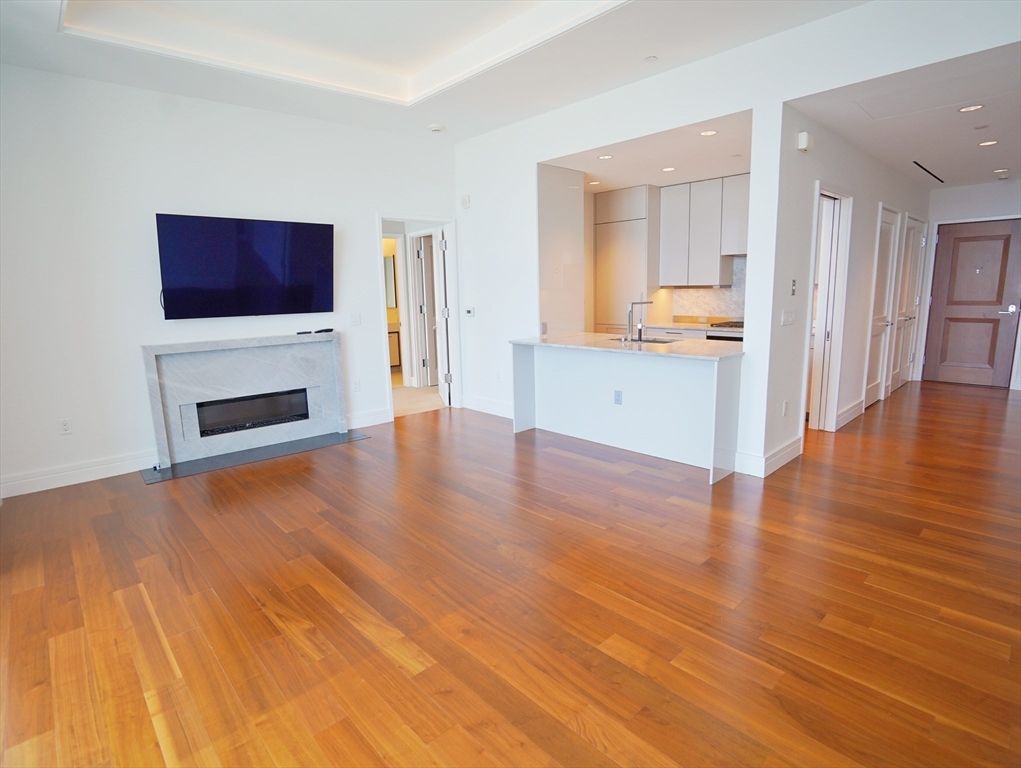 Empty room, Fireplace, Interior, Kitchen, Recessed Lighting, Wood Texture Flooring