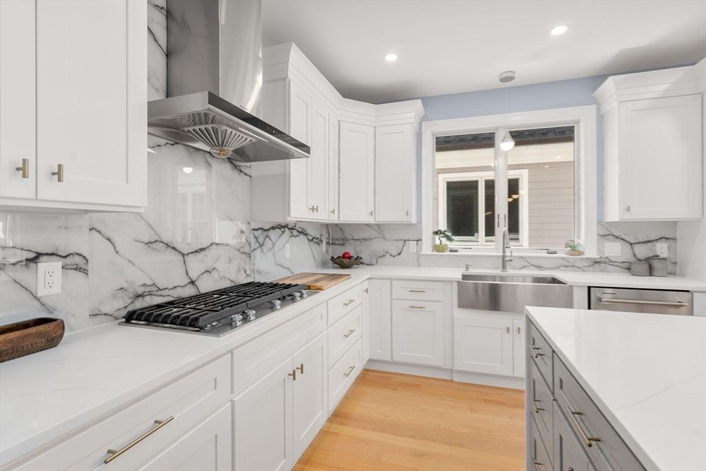 Interior, Kitchen, Marble Walls, Pendant Lights, Recessed Lighting, Stainless Steel Appliances, Wood Texture Flooring