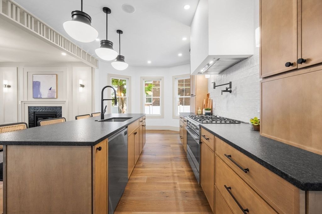 Fireplace, Interior, Kitchen, Pendant Lights, Recessed Lighting, Stainless Steel Appliances, Wood Texture Flooring