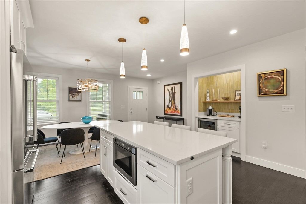 Chandelier, Dining room, Interior, Kitchen, Pendant Lights, Recessed Lighting, Stainless Steel Appliances, Wood Texture Flooring