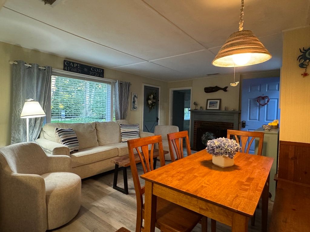 Dining room, Fireplace, Interior, Living room, Piano, Wood Texture Flooring