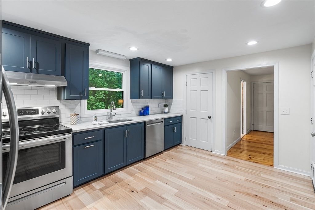Interior, Kitchen, Recessed Lighting, Stainless Steel Appliances, Wood Texture Flooring