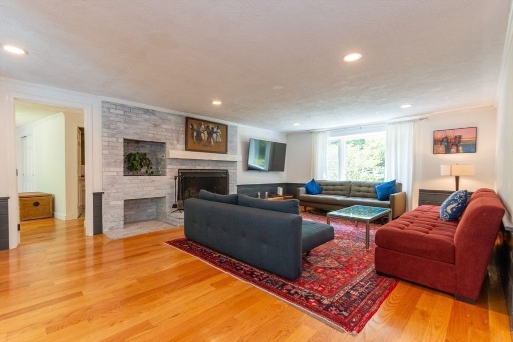 Fireplace, Interior, Living room, Recessed Lighting, Stone Walls, Wood Texture Flooring