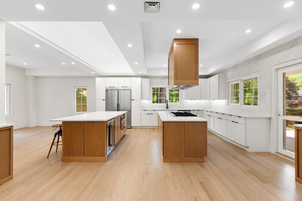 Interior, Kitchen, Marble Walls, Recessed Lighting, Stainless Steel Appliances, Wood Texture Flooring