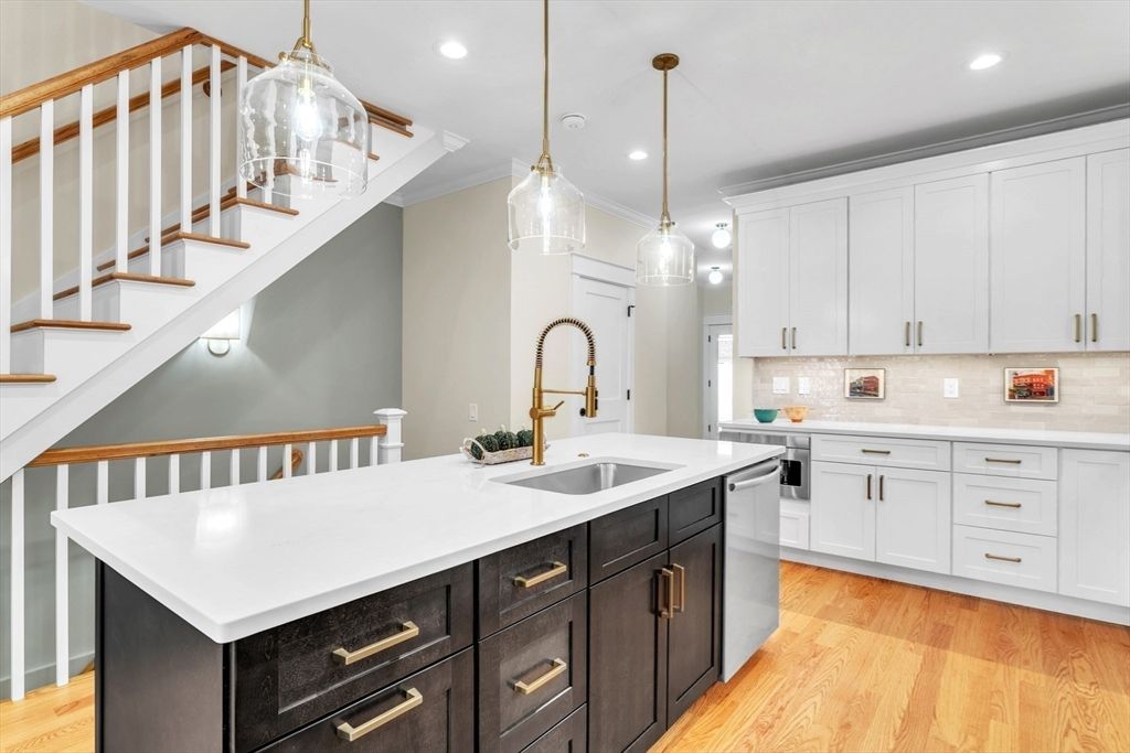 Dining room, Interior, Kitchen, Living room, Pendant Lights, Recessed Lighting, Stainless Steel Appliances, Wood Texture Flooring