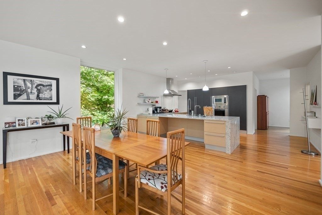 Dining room, Interior, Kitchen, Pendant Lights, Recessed Lighting, Stainless Steel Appliances, Wood Texture Flooring
