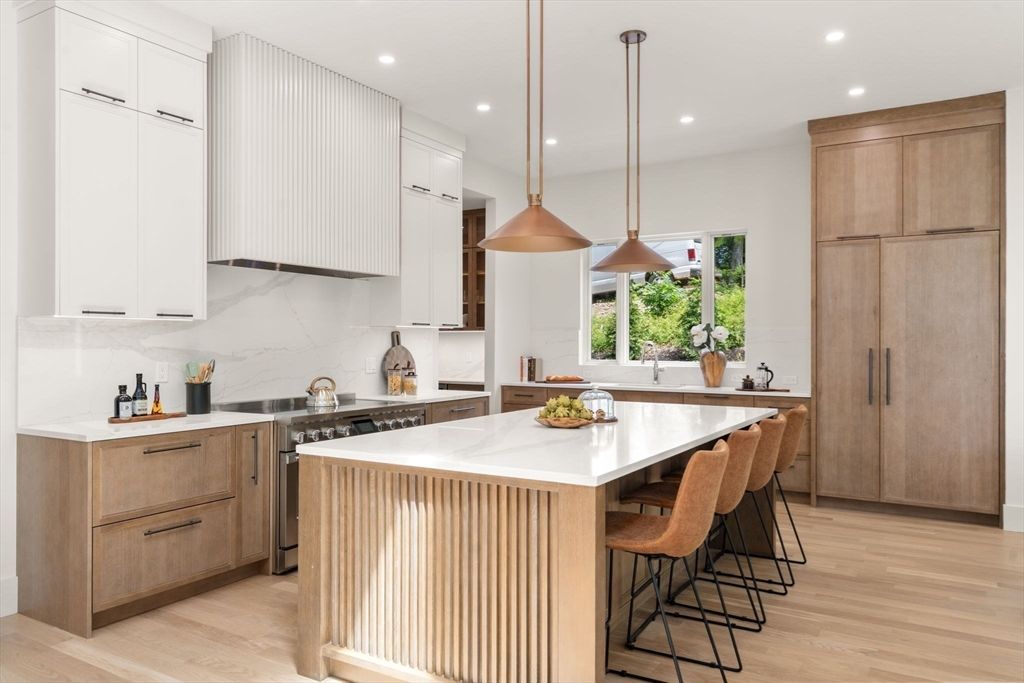 Interior, Kitchen, Marble Walls, Pendant Lights, Recessed Lighting, Stainless Steel Appliances, Wood Texture Flooring