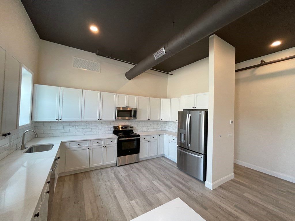 Interior, Kitchen, Recessed Lighting, Stainless Steel Appliances, Wood Texture Flooring