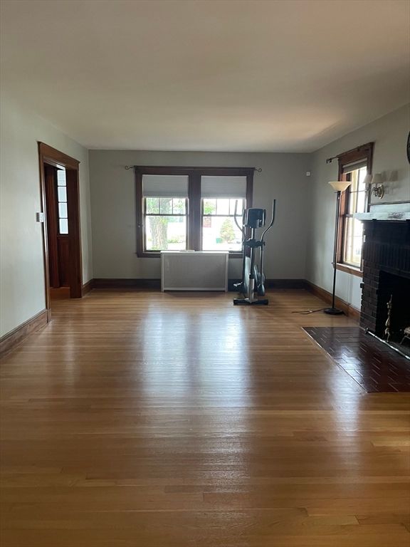 Fireplace, Fitness Equipment, Interior, Wood Texture Flooring