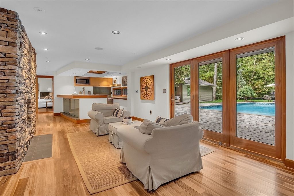 Fireplace, Interior, Living room, Recessed Lighting, Stone Walls, Wood Texture Flooring
