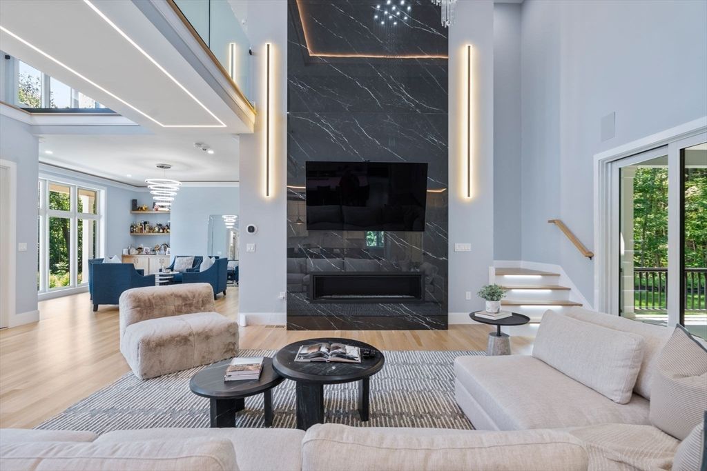 Fireplace, Interior, Living room, Marble Walls, Pendant Lights, Recessed Lighting, Wood Texture Flooring