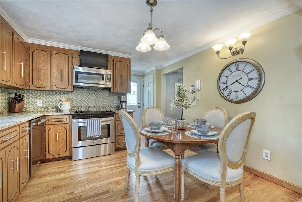 Dining room, Interior, Kitchen, Pendant Lights, Stainless Steel Appliances, Wood Texture Flooring