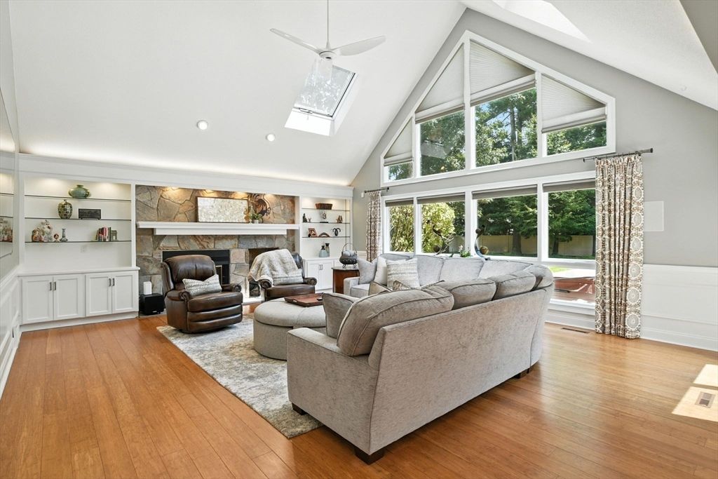 Fireplace, Interior, Living room, Recessed Lighting, Stone Walls, Wood Texture Flooring