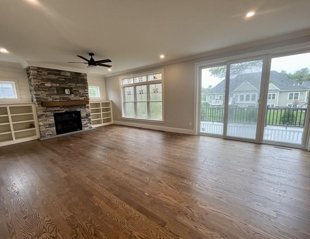 Empty room, Fireplace, Interior, Recessed Lighting, Stone Walls, Wood Texture Flooring