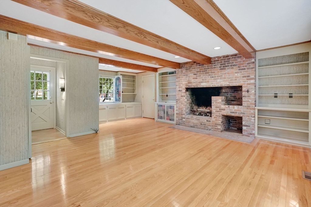 Empty room, Fireplace, Interior, Recessed Lighting, Stone Walls, Wooden Beams, Wood Texture Flooring