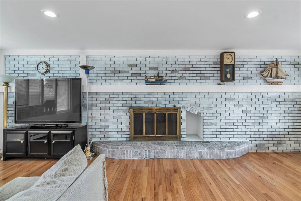 Fireplace, Interior, Recessed Lighting, Stone Walls, Wood Texture Flooring