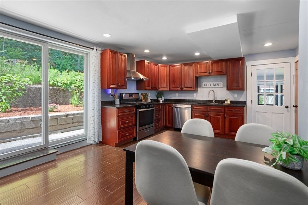 Dining room, Interior, Kitchen, Recessed Lighting, Stainless Steel Appliances, Wood Texture Flooring