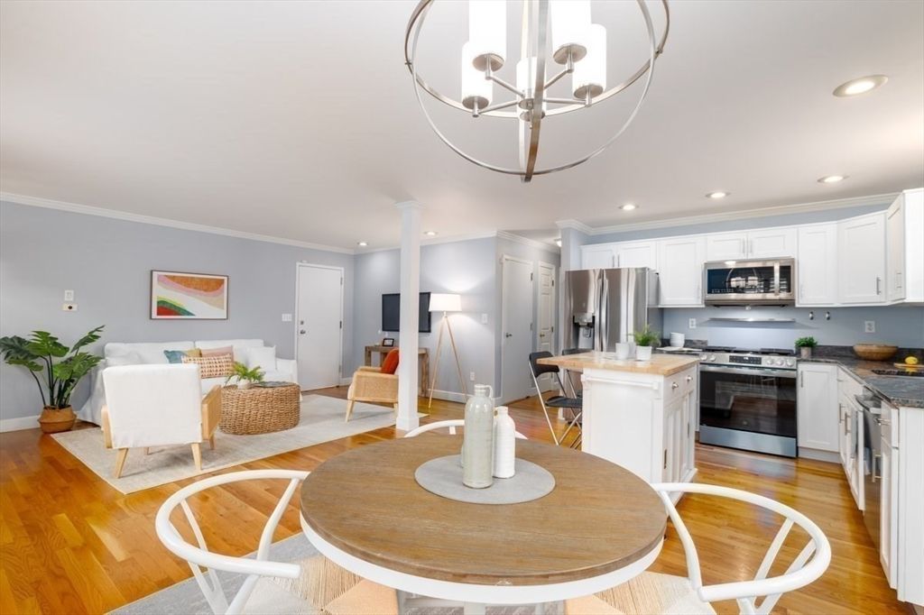 Chandelier, Dining room, Interior, Kitchen, Living room, Recessed Lighting, Stainless Steel Appliances, Wood Texture Flooring