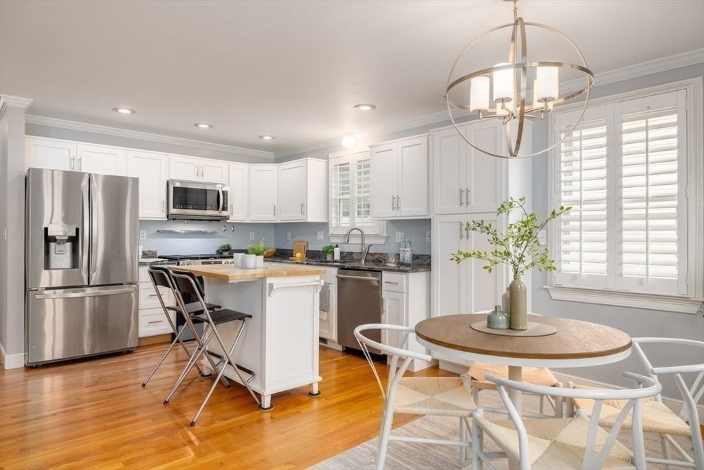 Chandelier, Dining room, Interior, Kitchen, Recessed Lighting, Stainless Steel Appliances, Wood Texture Flooring