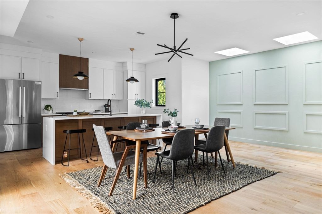 Dining room, Interior, Kitchen, Pendant Lights, Recessed Lighting, Stainless Steel Appliances, Wood Texture Flooring