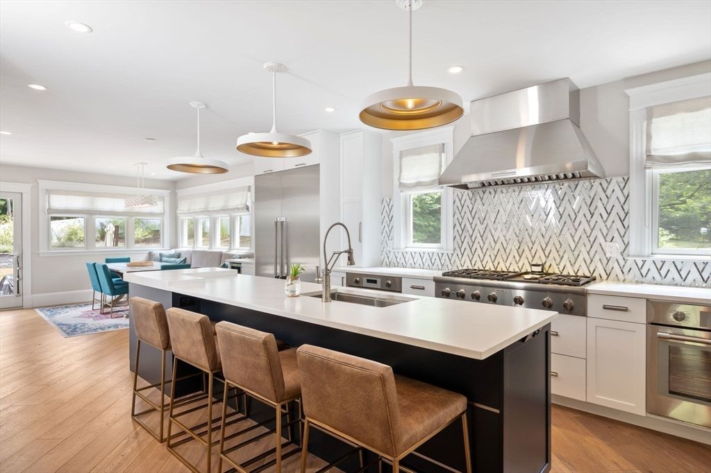 Dining room, Interior, Kitchen, Pendant Lights, Recessed Lighting, Stainless Steel Appliances, Wood Texture Flooring