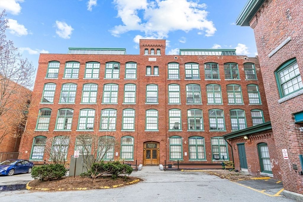 Exterior, Facade, Brick Facade, Condo Building