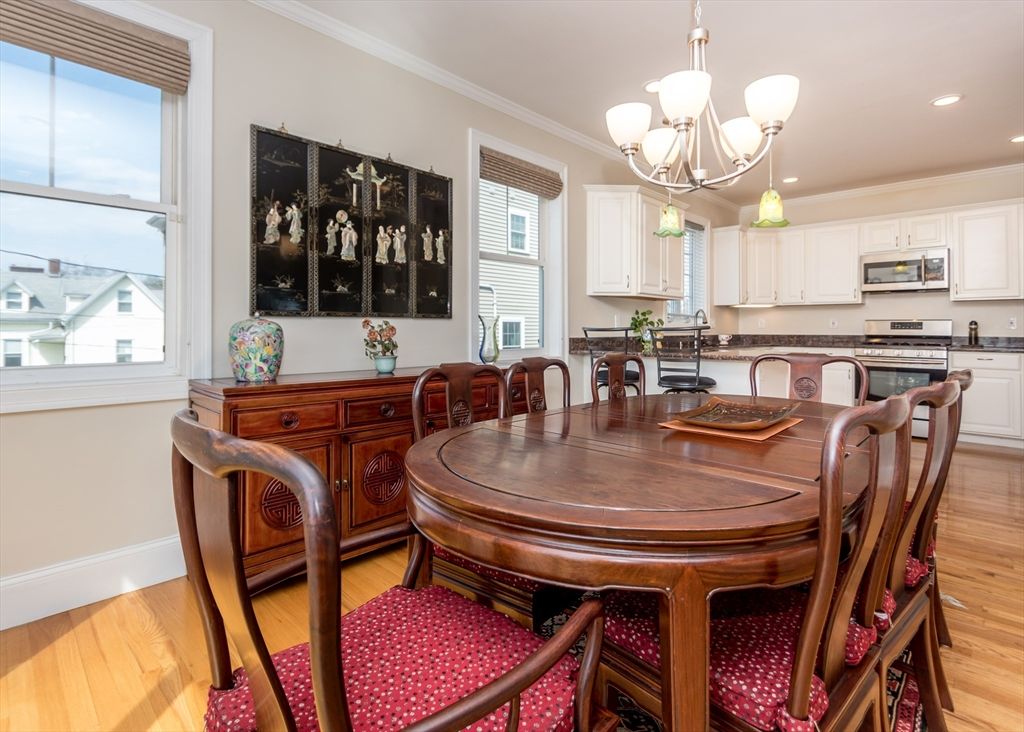 Chandelier, Dining room, Interior, Kitchen, Recessed Lighting, Stainless Steel Appliances, Wood Texture Flooring