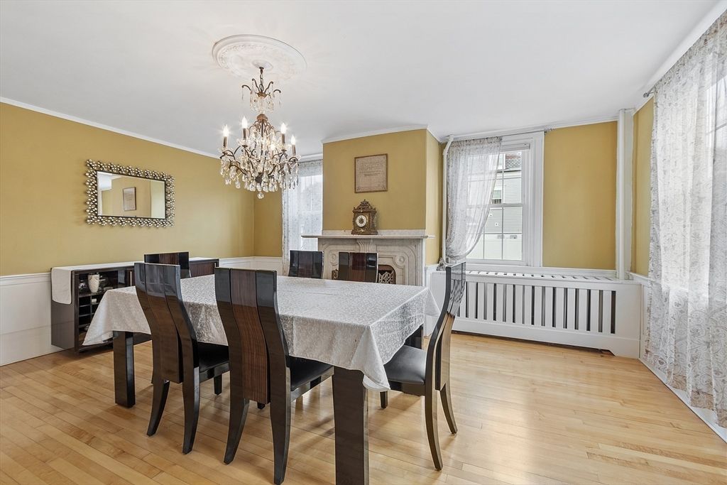 Chandelier, Dining room, Fireplace, Interior, Wood Texture Flooring