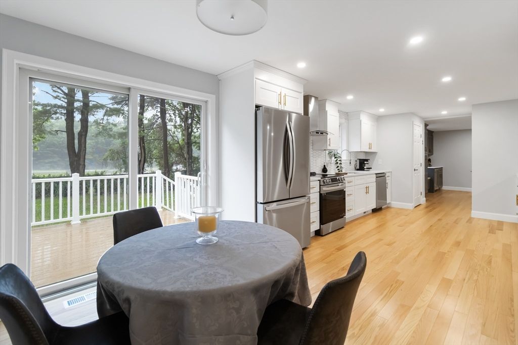 Dining room, Interior, Kitchen, Recessed Lighting, Stainless Steel Appliances, Wood Texture Flooring