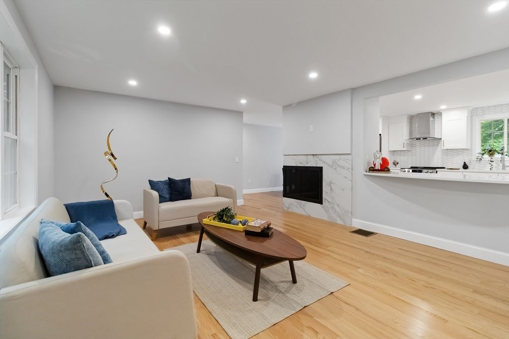 Fireplace, Interior, Kitchen, Living room, Marble Walls, Recessed Lighting, Wood Texture Flooring