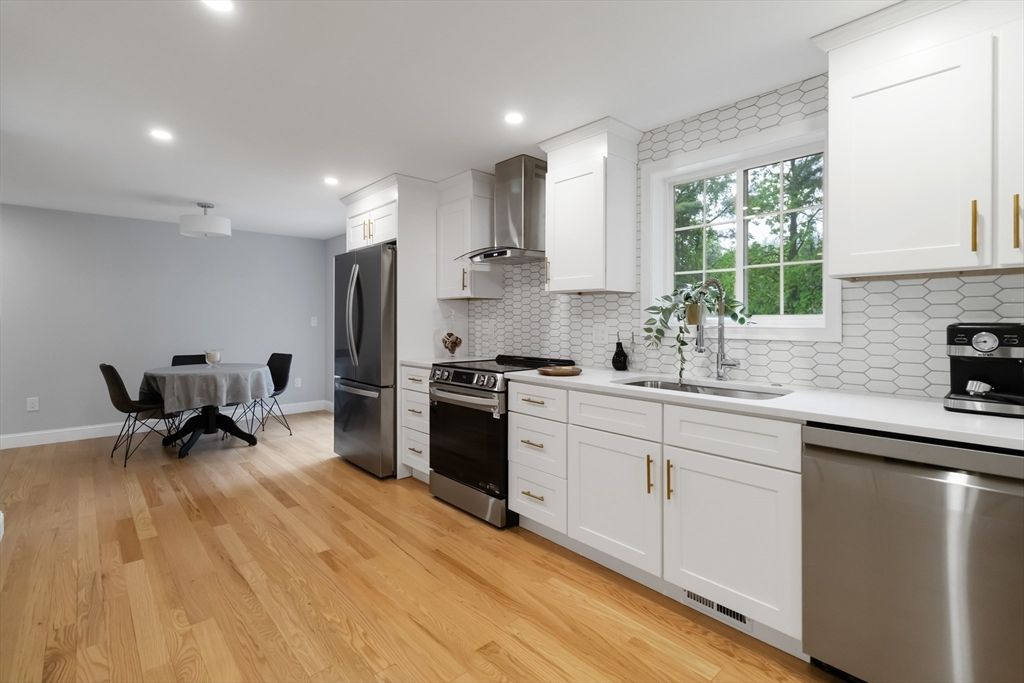 Dining room, Interior, Kitchen, Recessed Lighting, Stainless Steel Appliances, Wood Texture Flooring