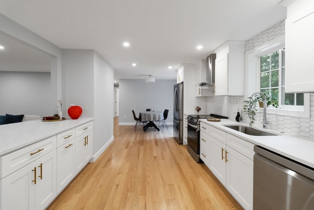 Dining room, Interior, Kitchen, Recessed Lighting, Stainless Steel Appliances, Wood Texture Flooring