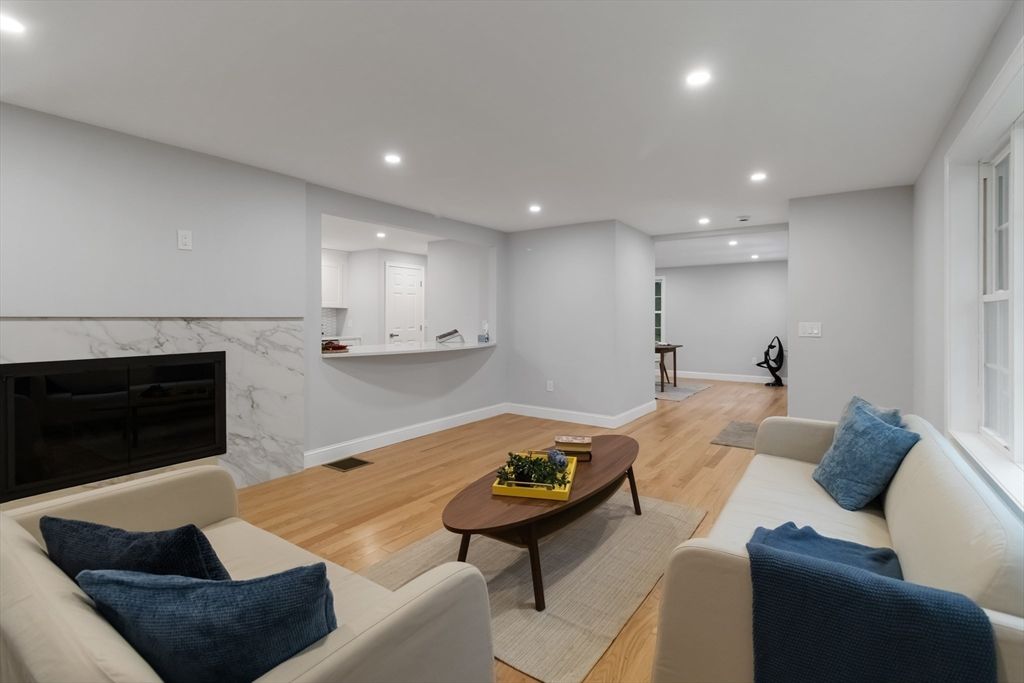 Interior, Living room, Marble Walls, Recessed Lighting, Wood Texture Flooring