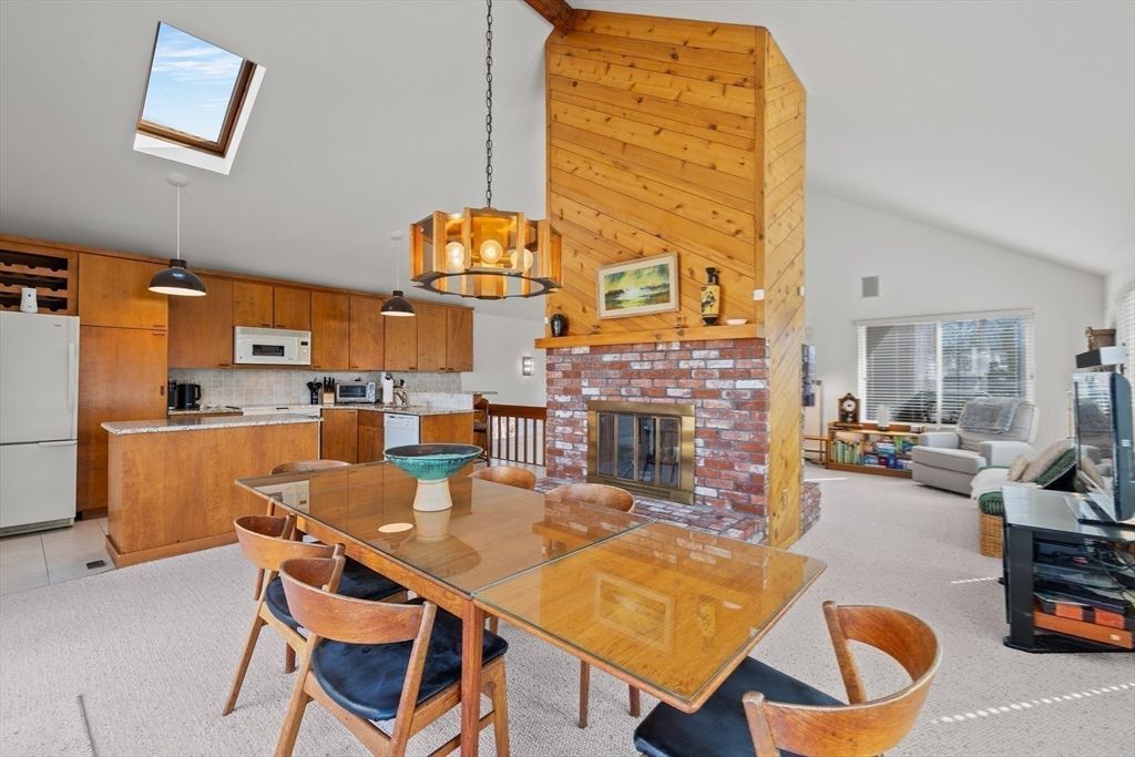 Dining room, Fireplace, Interior, Kitchen, Living room, Pendant Lights, Stainless Steel Appliances, Wooden Walls