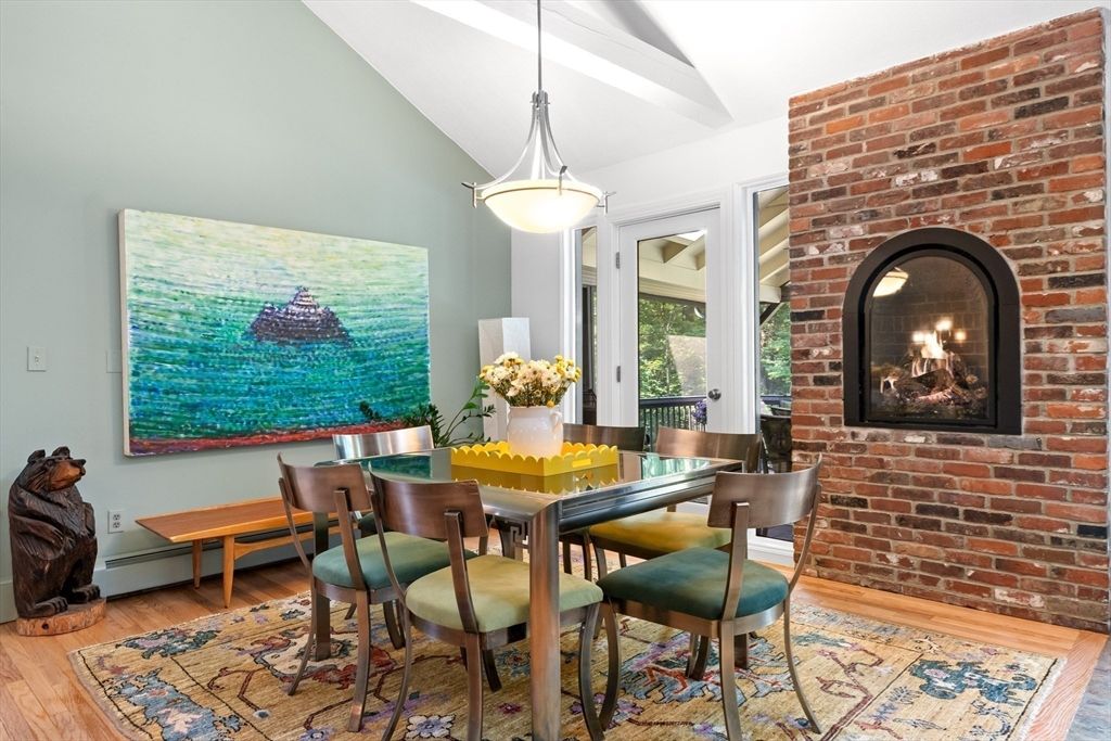 Dining room, Fireplace, Interior, Pendant Lights, Stone Walls, Wood Texture Flooring