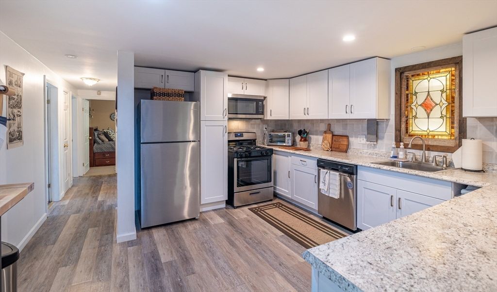 Interior, Kitchen, Recessed Lighting, Stainless Steel Appliances, Wood Texture Flooring