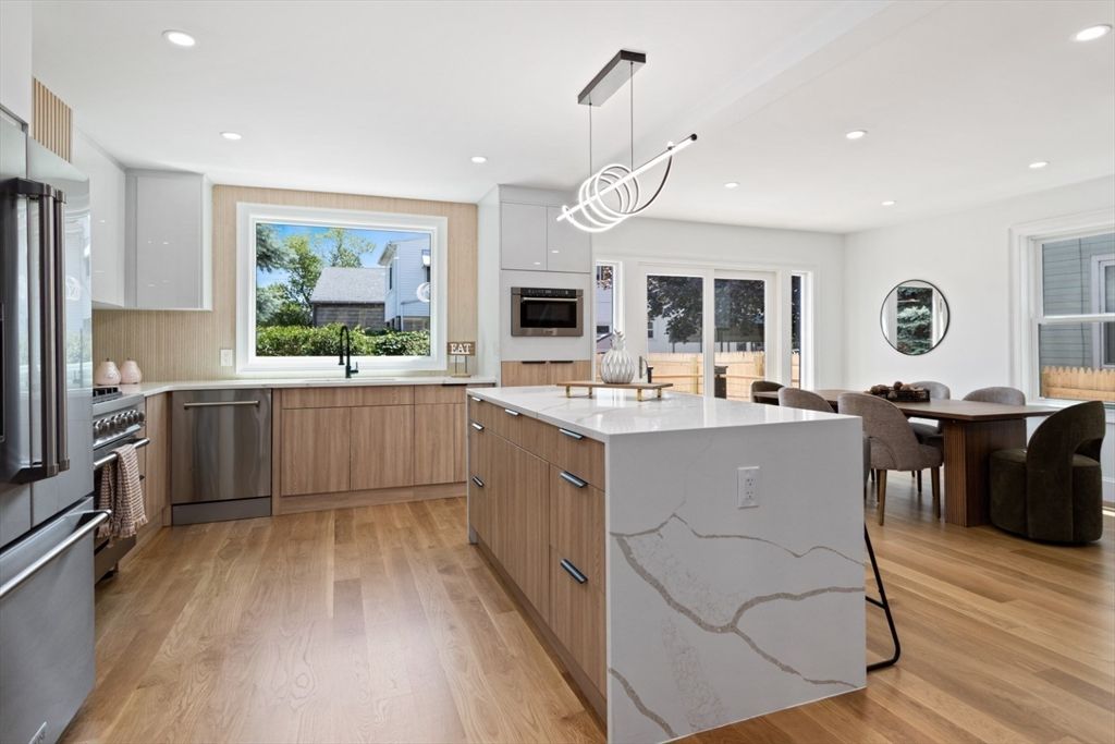 Dining room, Interior, Kitchen, Pendant Lights, Recessed Lighting, Stainless Steel Appliances, Wood Texture Flooring