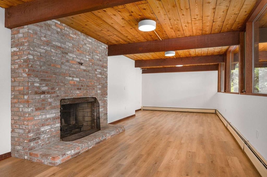 Empty room, Fireplace, Interior, Stone Walls, Wooden Beams, Wooden Ceilings, Wood Texture Flooring