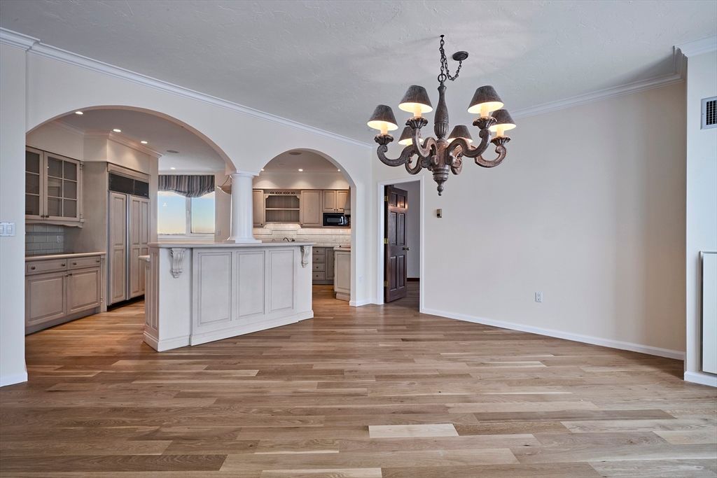 Chandelier, Interior, Kitchen, Recessed Lighting, Stainless Steel Appliances, Wood Texture Flooring