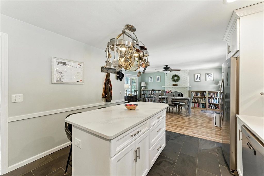 Chandelier, Dining room, Fireplace, Interior, Kitchen, Stone Walls, Wood Texture Flooring
