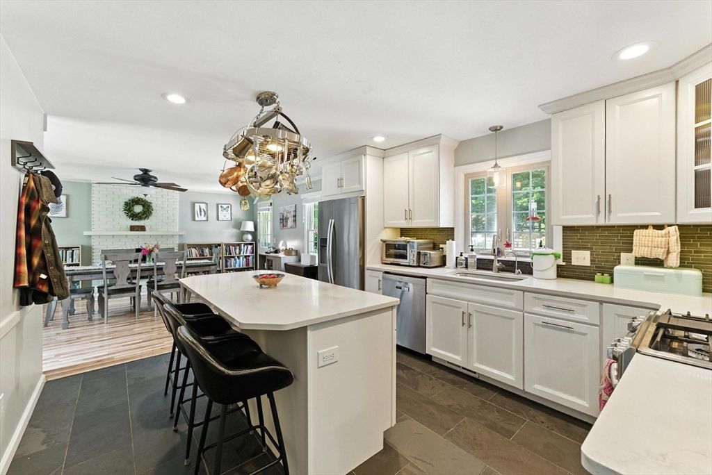 Dining room, Fireplace, Interior, Kitchen, Pendant Lights, Recessed Lighting, Stainless Steel Appliances, Stone Walls
