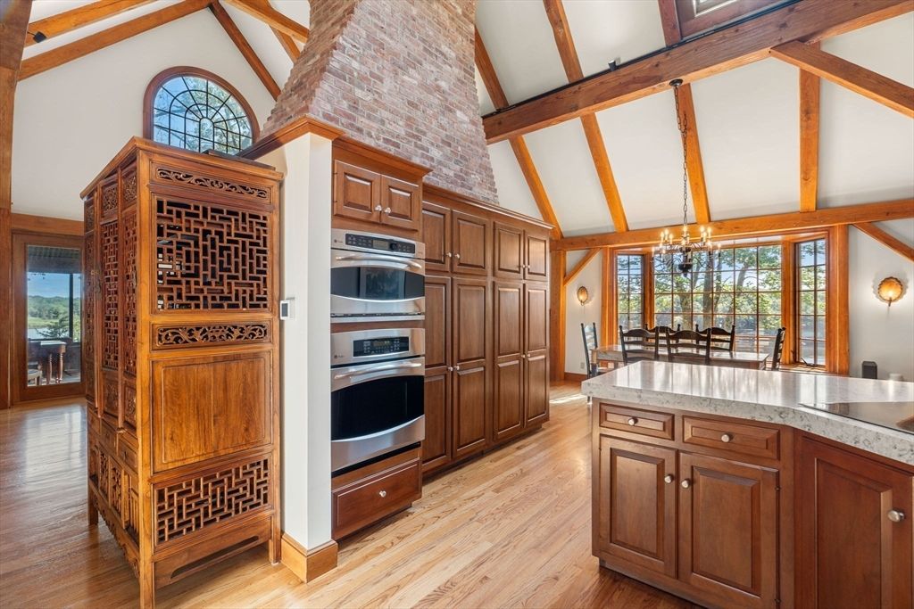 Chandelier, Dining room, Interior, Kitchen, Stainless Steel Appliances, Wooden Beams, Wood Texture Flooring