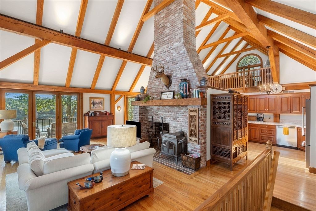 Chandelier, Fireplace, Interior, Living room, Stone Walls, Wooden Beams, Wood Texture Flooring