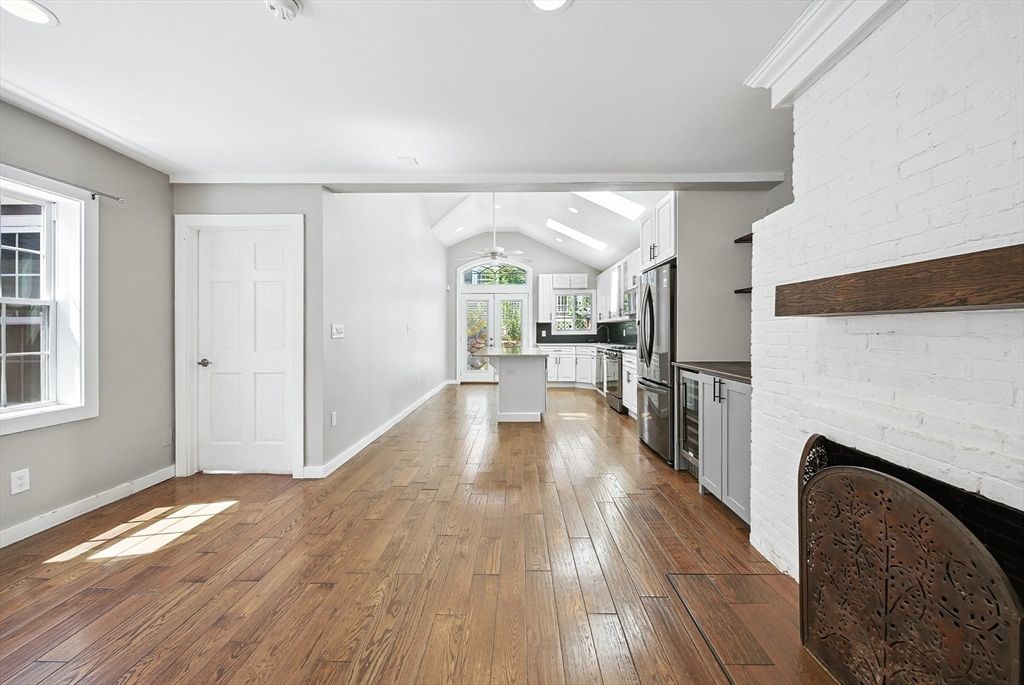 Fireplace, Interior, Kitchen, Recessed Lighting, Stone Walls, Wood Texture Flooring